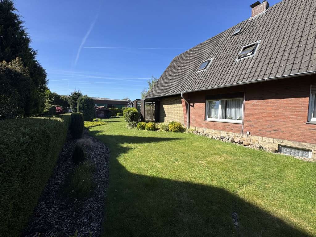 Immobilie in Rhede - Freistehendes Zweifamilienhaus mit großem Grundstück in zentraler Lage  von Rhede zu verkaufen - Bild 2