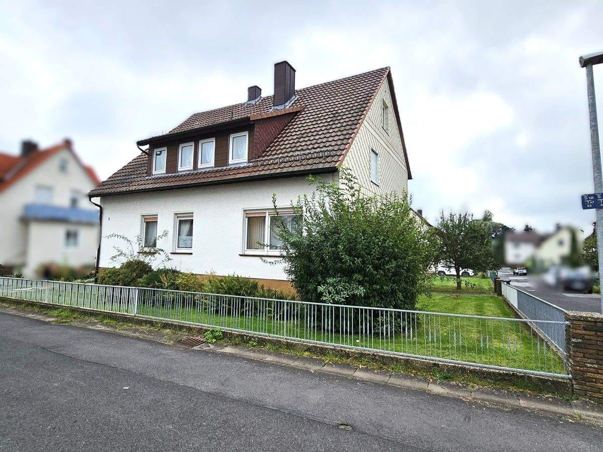 Immobilie in Ahnatal - Gepflegtes Zweifamilienhaus in Ahnatal-Weimar - Bild 0