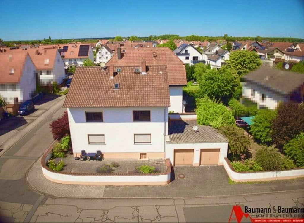 Immobilie in Münster (Hessen) - Zentral und dennoch ruhig gelegenes Dreifamilienhaus in Münster *Provisionsfrei* - Bild 2