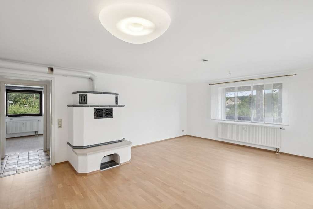 Immobilie in Petersdorf - Ihr Rückzugsort im Grünen: Wohnung mit Kamin, Garage und Garten - Bild 2