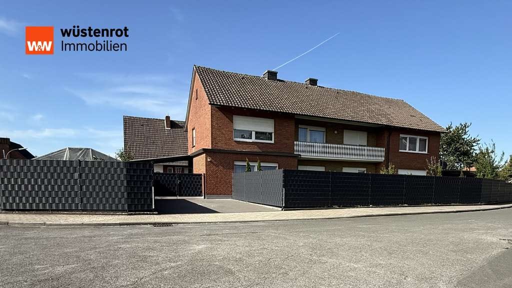 Immobilie in Dülmen - Freistehendes Zweifamilienhaus mit Garten, Doppelgarage und Carport! - Bild 0