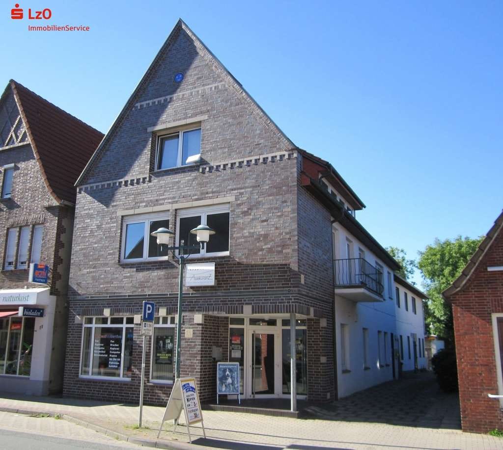 Immobilie in Wildeshausen - Mehrfamilienhaus mit Gewerbeeinheit und Baugrundstück in Wildeshausen - Bild 0