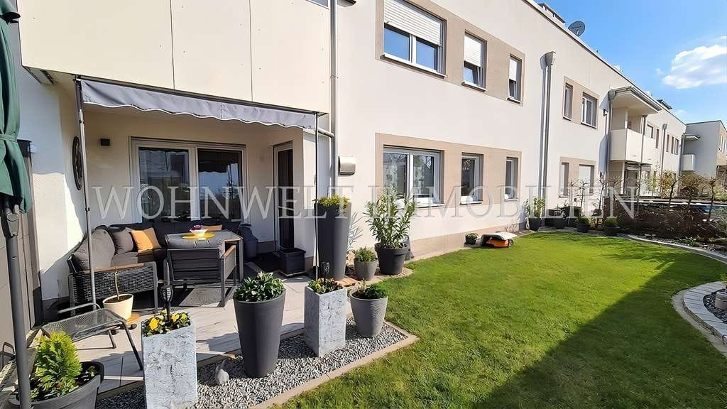 Immobilie in Neufahrn in Niederbayern - Helle, barrierefreie 2-Zi.-EG-Wohnung mit gepflegtem Garten - Bild 2