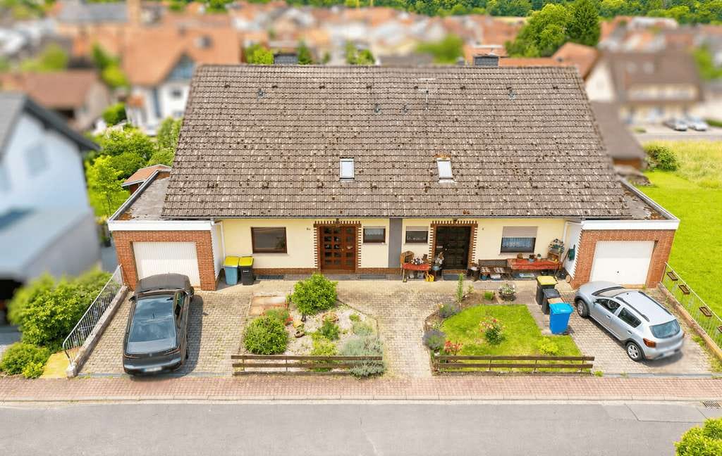 Immobilie in Biebergemünd - Zwei Doppelhaushälften Biebergemünd-Kassel | 343 m² · ELW · PV - Bild 1