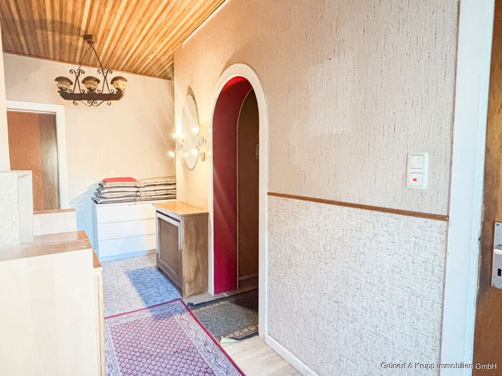 Immobilie in Grömitz - Renovierungsbedürftiges Einfamilienhaus/Gästehaus in eingewachsener Wohngegend - Bild 3
