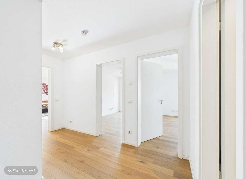 Immobilie in Kenzingen - Traumhafte 3-Zimmer Wohnung mit Teichblick - Balkon & Tiefgarage - Bild 1