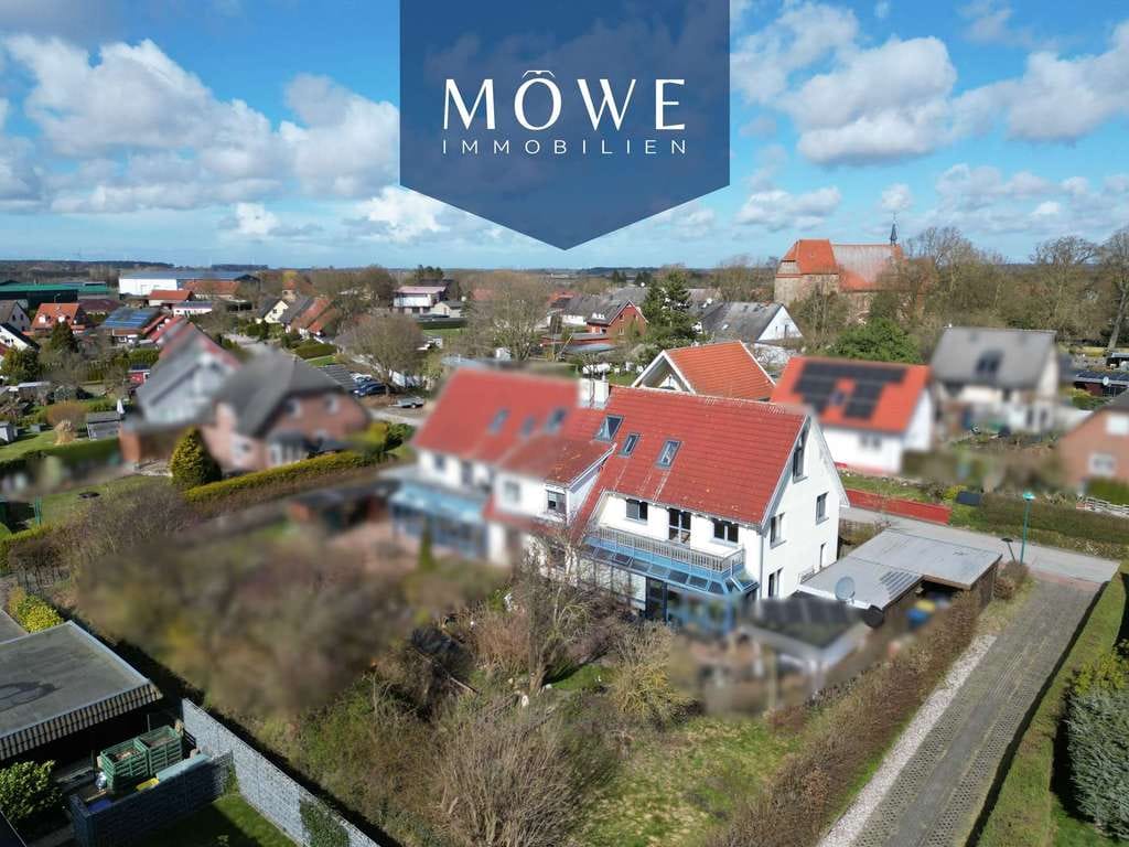 Immobilie in Dummerstorf - Wohnen auf zwei Ebenen Am Südwesthang in Petschow - Bild 0