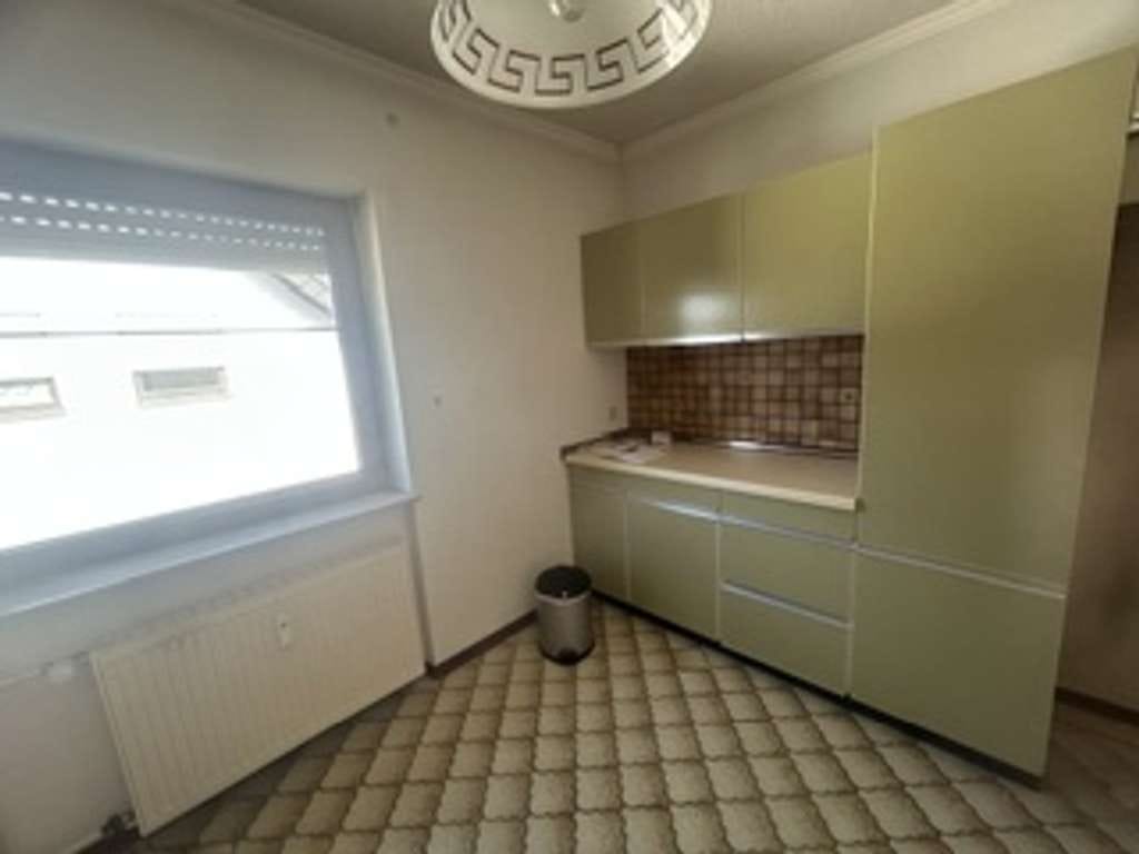 Immobilie in Karlsdorf-Neuthard - Gutgeschnittene 3-Zi.-ETW in ruhiger Lage von Karlsdorf m.  TLB, Gäste-WC, Balkon u. Carport - Bild 4