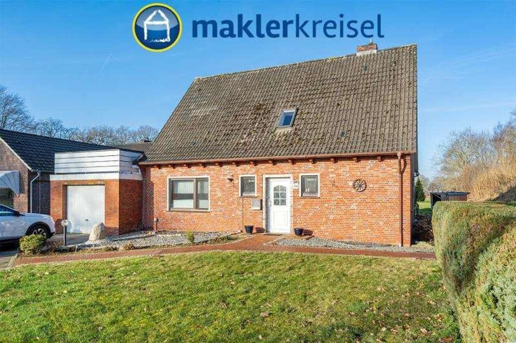 Immobilie in Wittmund - Einfamilienhaus mit Garage und großem Grundstück in Ardorf - Bild 0