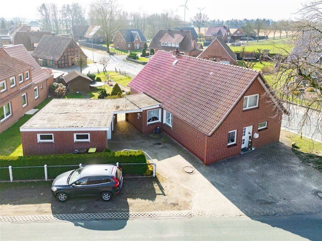 Immobilie in Twistringen - Charmantes Einfamilienhaus in guter Lage, mit Garage und Garten -- Platz zum Leben und zum Wohlfühlen für die ganze Familie! - Bild 0