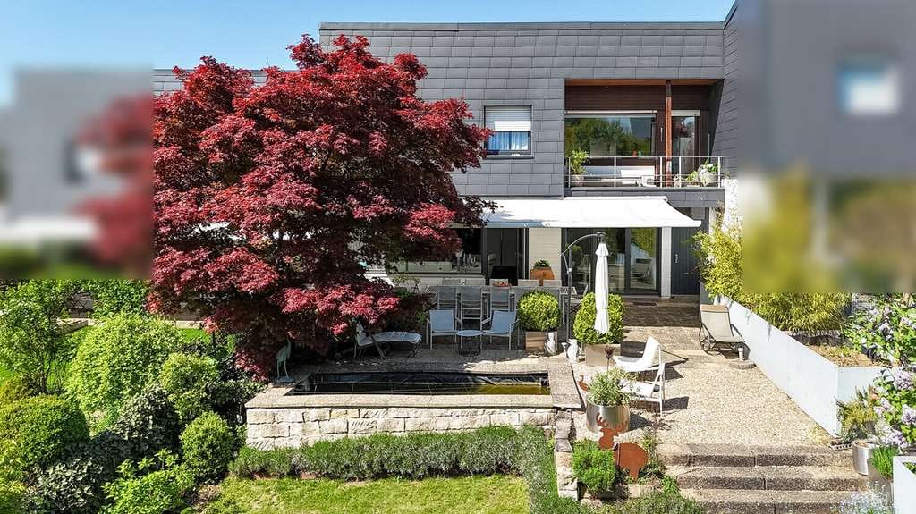 Immobilie in Riederich - Einzigartiges Wohnhaus im Grünen – stilvoll modernisiertes Reihenmittelhaus mit Gartenparadies - Bild 1