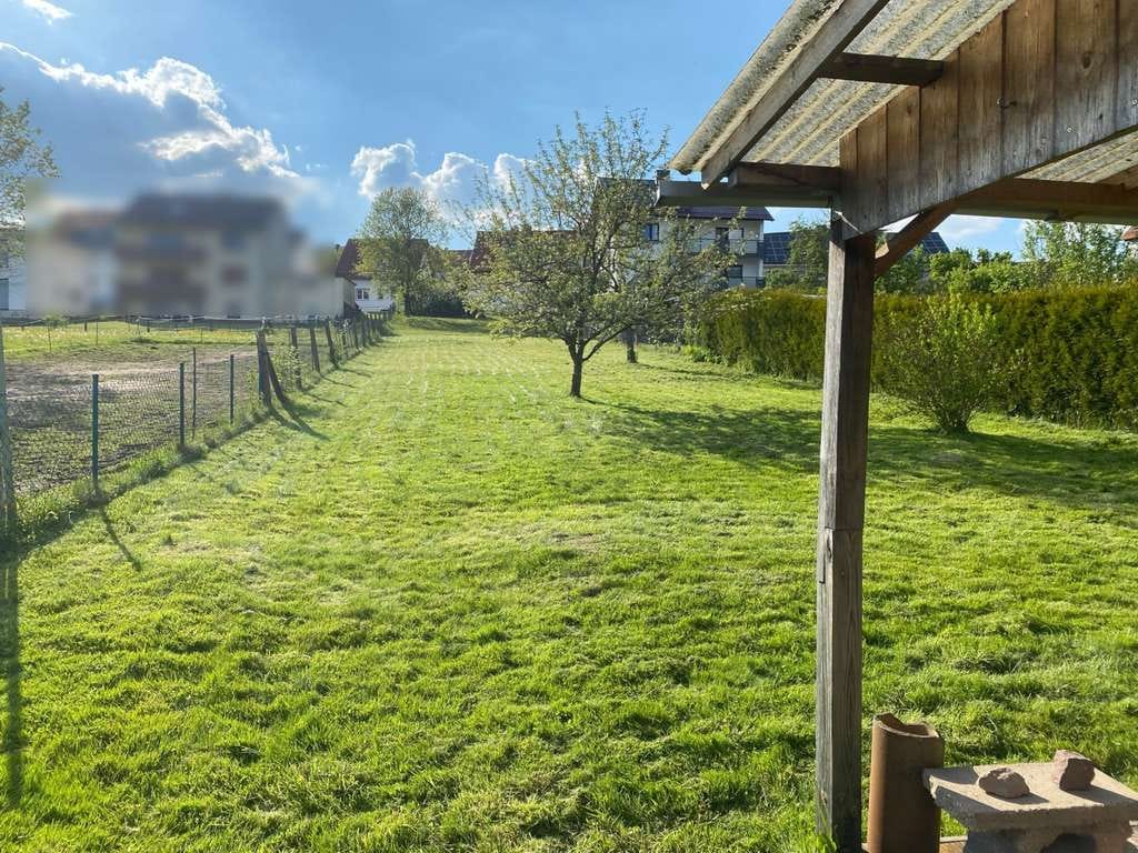 Immobilie in Helsa - Schöne Doppelhaushälfte mit Potenzial und schönem großen Garten - Bild 0