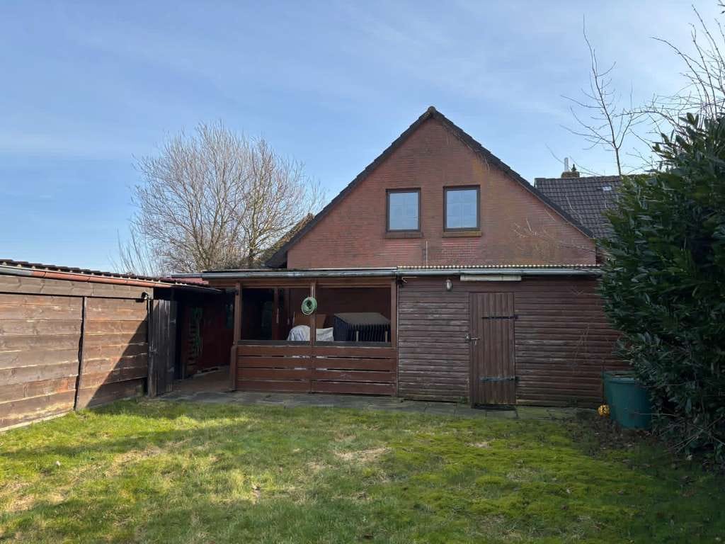 Immobilie in Großheide - Einfamilienhaus mit Einliegerwohnung in Sackgassenlage - Bild 3