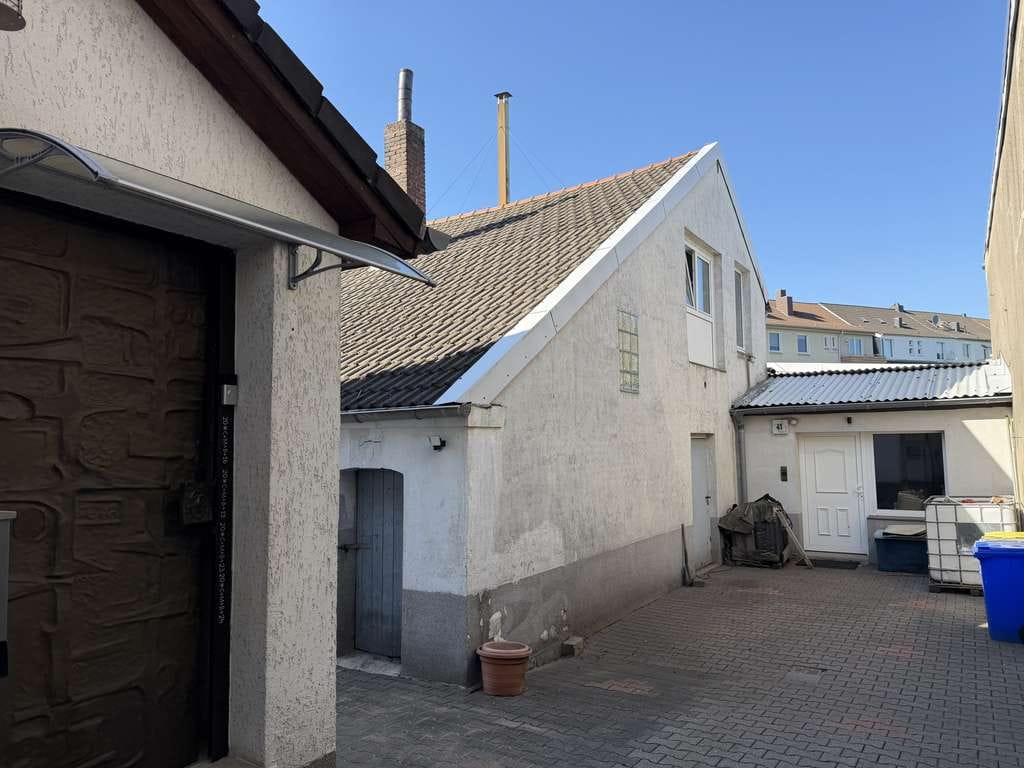 Immobilie in Gladbeck - Vielseitiges, freistehendes Dreifamilienhaus mit Werkstatt in zentraler Lage von Gladbeck - Bild 4