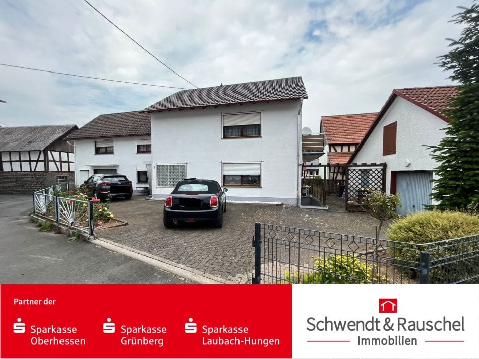 Immobilie in Ulrichstein - Einfamilienhaus mit zwei Garagen und separatem Gartengrundstück in Ulrichstein-Wohnfeld - Bild 0