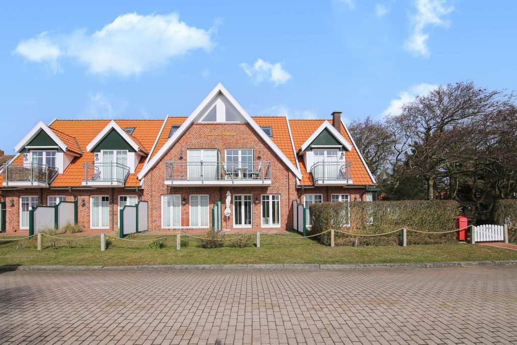 Immobilie in Juist - Ferienwohnung mit Reihenmittelhaus Charakter ca. 83 m², mit Balkon und Terrasse auf Juist - Loog - Bild 0