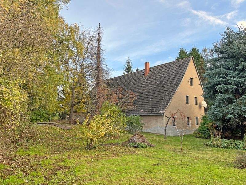 Immobilie in Oschatz - Idyllisches Grundstück mit eigenem Quellteich, Baumbestand und stark sanierungsbedürftigem Wohnhaus sowie großer Sche... - Bild 0