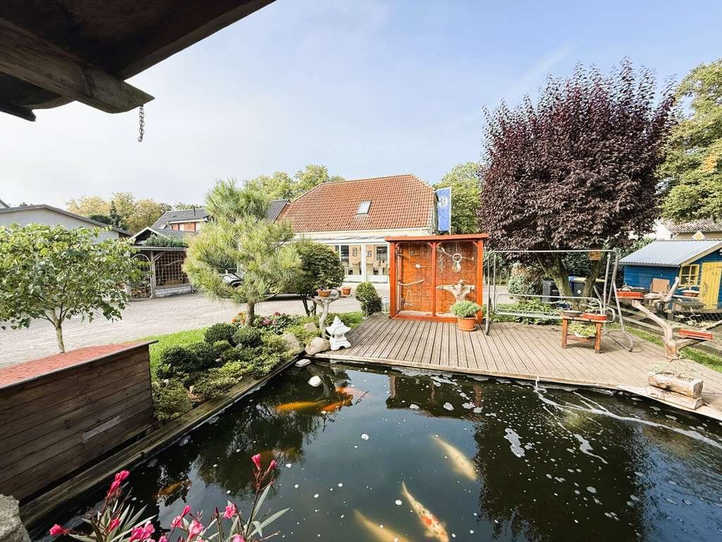 Immobilie in Wusterhausen/Dosse - Charmantes Einfamilienhaus mit großem Garten und Doppelgarage – für Kapitalanleger in Bantikow - Bild 4