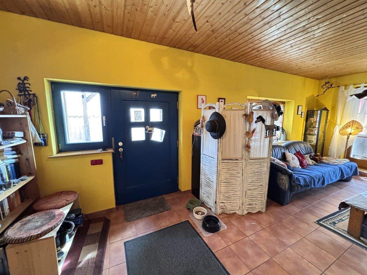 Immobilie in Markt Wald - Charmante Doppelhaushälfte mit zwei Wohneinheiten, ausbaufähigem Dachgeschoss und Naturgarten - Bild 2