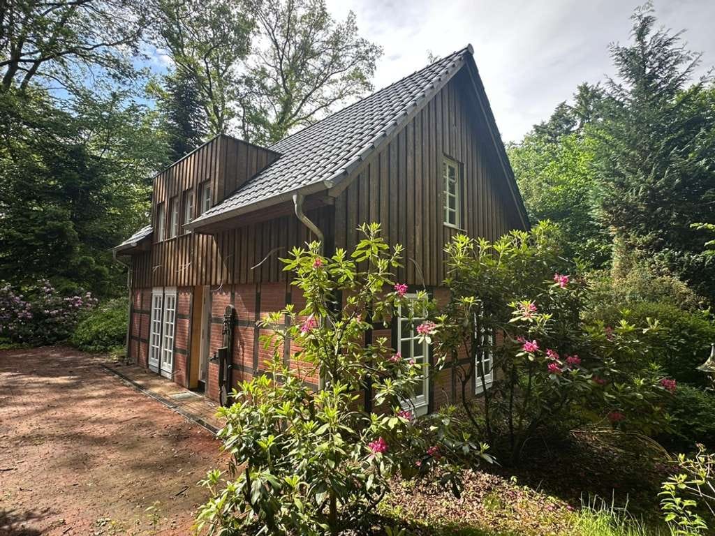 Immobilie in Dötlingen - ZWISCHEN BÄUMEN UND WEITE! Wochenendhaus in absolut ruhiger und naturnaher Wohnlage! Waldgrundstück! - Bild 1