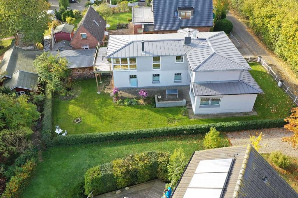 Immobilie in Langballig - Wohnen mit Meerblick – Zweifamilienhaus in traumhafter Fördelage - Bild 3