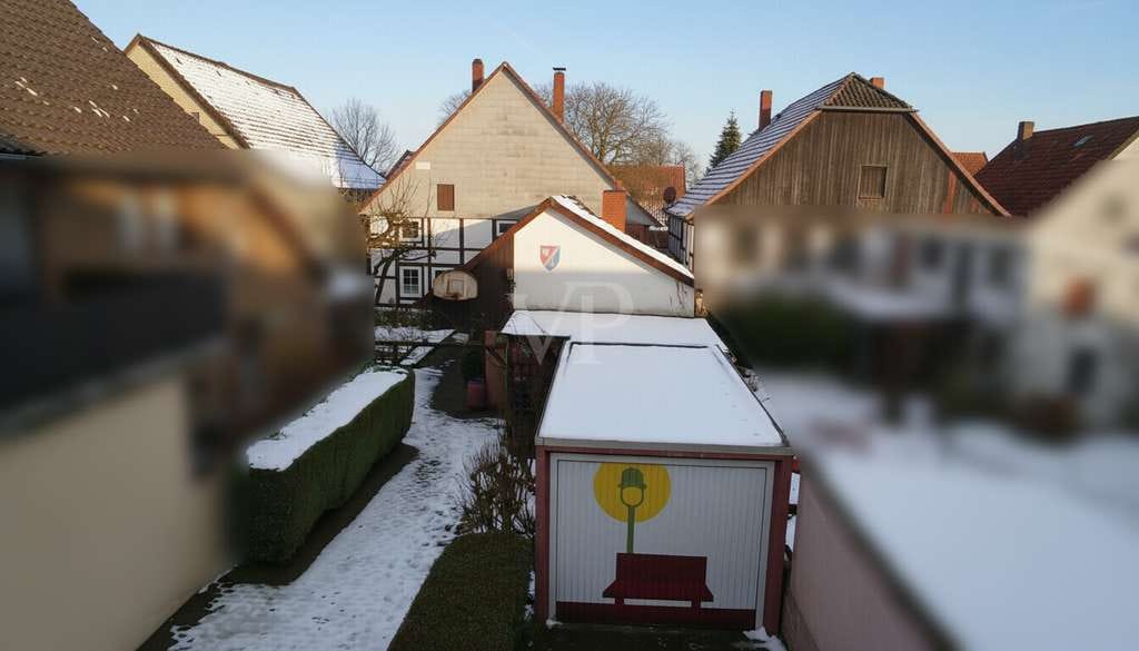 Immobilie in Hessisch Oldendorf - Familiendomizil mit Ausbaupotenzial und gemütlichem Garten in Wesernähe - Bild 4