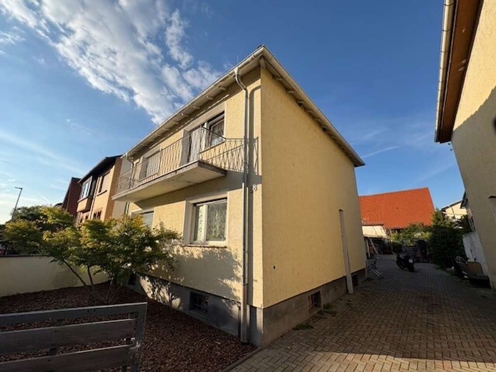 Immobilie in Lambsheim - Zweifamilienhaus in ruhiger Lage mit Bauplatz - Bild 1