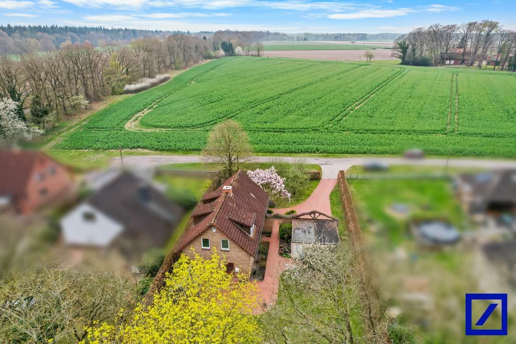 Immobilie in Kirchlinteln - Einfamilienhaus mit sonniger Terrasse und Garten in ruhiger Umgebung - Bild 1