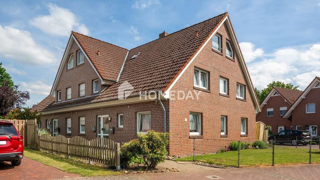 Immobilie in Menslage - Mehrfamilienhaus mit 4 Wohneinheiten, Garten, Dachboden, Carports und ca. 360 m² Wohnfläche - Bild 0