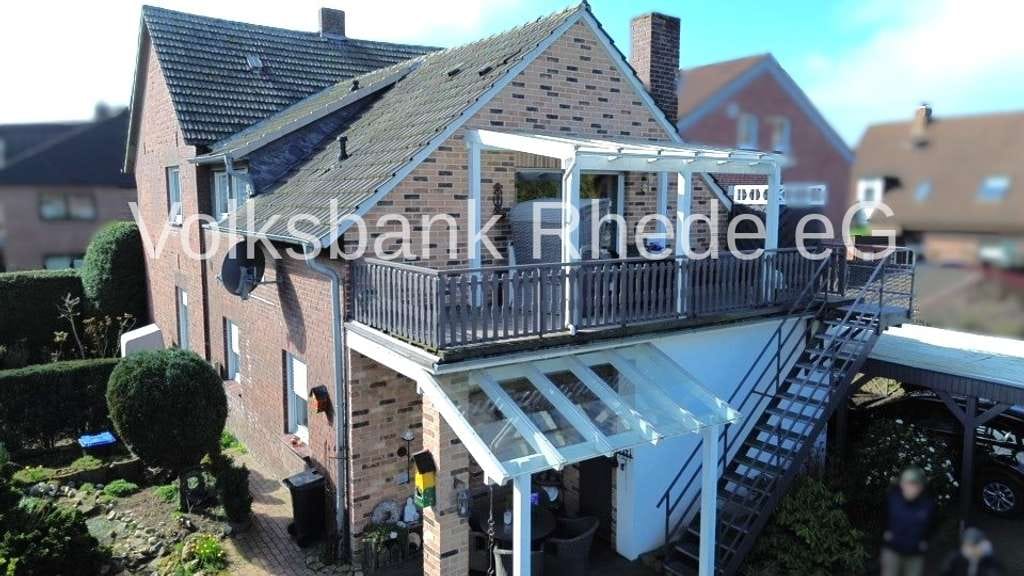 Immobilie in Rhede - Attraktives Zweiparteienhaus mit schönem Garten, Teich, Balkon in ruhiger Lage von Rhede - Bild 4