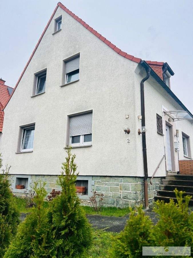 Immobilie in Werl - Ein-/Zweifamilienhaus mit Gartenidylle und Ausbaupotential in Werl-Büderich zu verkaufen! - Bild 1