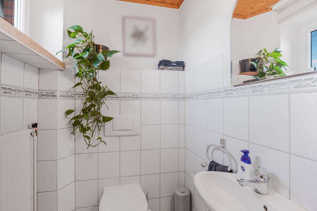 Immobilie in Westerrönfeld - Charmantes Einfamilienhaus mit Sonnenterrasse, großem Garten und Raum für neue Ideen - Bild 2