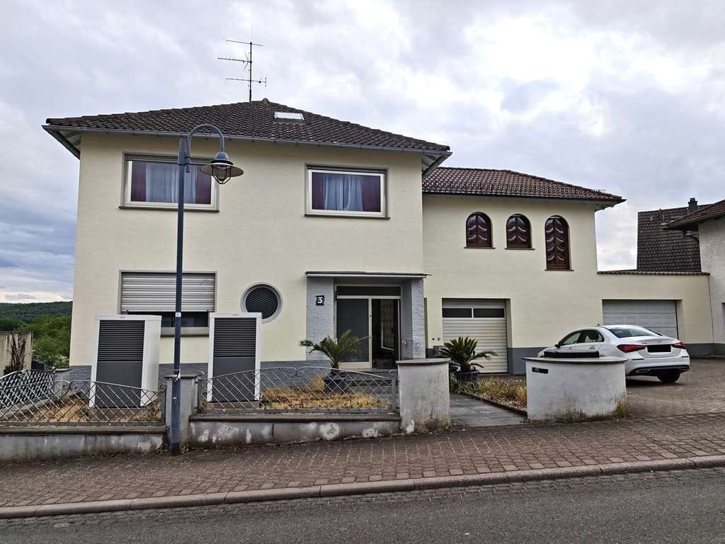 Immobilie in Daxweiler - Daxweiler - Attraktives Einfamilienhaus mit ELW, traumhaftem Fernblick und großen Nutzflächen - Bild 0