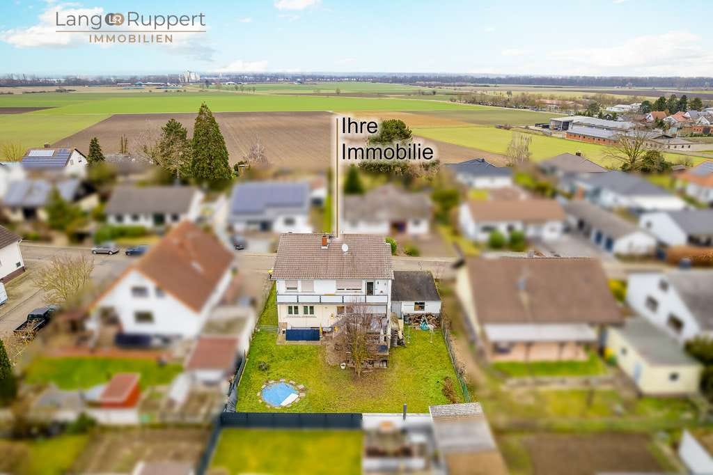 Immobilie in Biblis - Vermietetes, teilmodernisiertes Zweifamilienhaus mit Garten - Bild 4