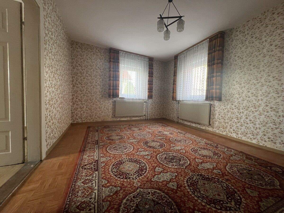 Immobilie in Marxzell - Ein Haus, viele Möglichkeiten! Zweifamilienhaus mit Scheune, Garagen, Garten und Schwarzwaldblick! - Bild 3