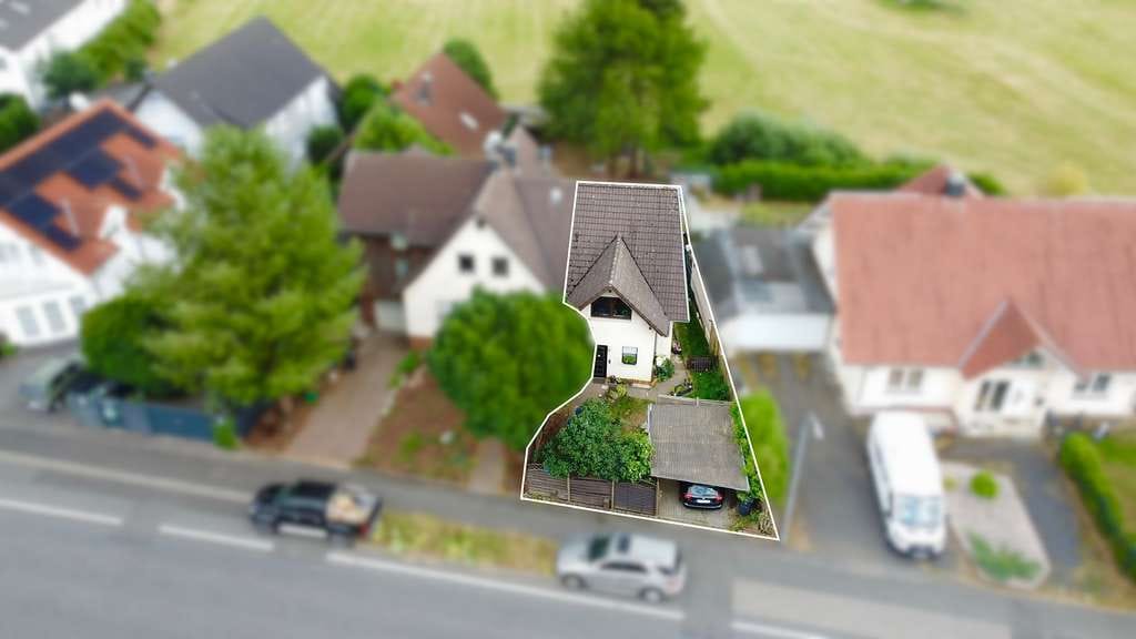 Immobilie in Wächtersbach - Ihr neues Zuhause mit Garten, Carport und viel Gestaltungspotenzial! - Bild 1