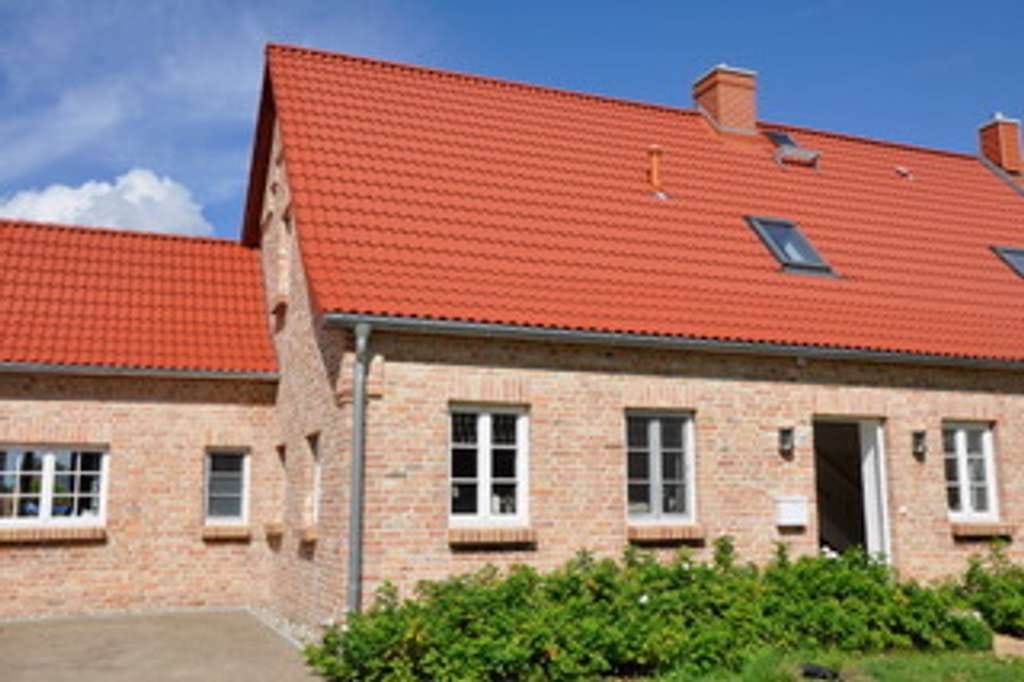 Immobilie in Gnoien - Charmantes, hochwertig saniertes Einfamilienhaus mit Einliegerwohnung und historischem Flair - Bild 2