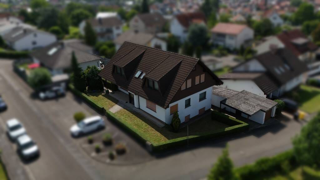 Immobilie in Linden - Repräsentatives, großzügiges Mehrfamilienhaus mit zwei Wohneinheiten in attraktiver Lage von Lind... - Bild 2