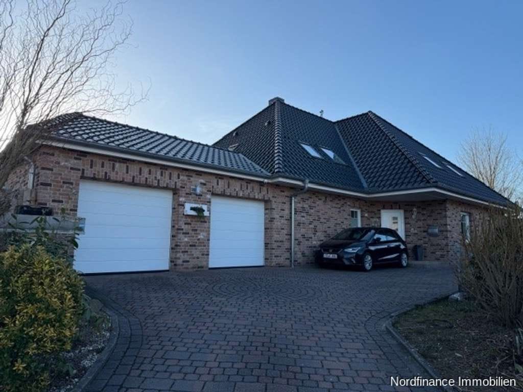 Immobilie in Wesenberg - Neuwertige Eigentumswohnung mit Garage und Gartengrundstück - Bild 1
