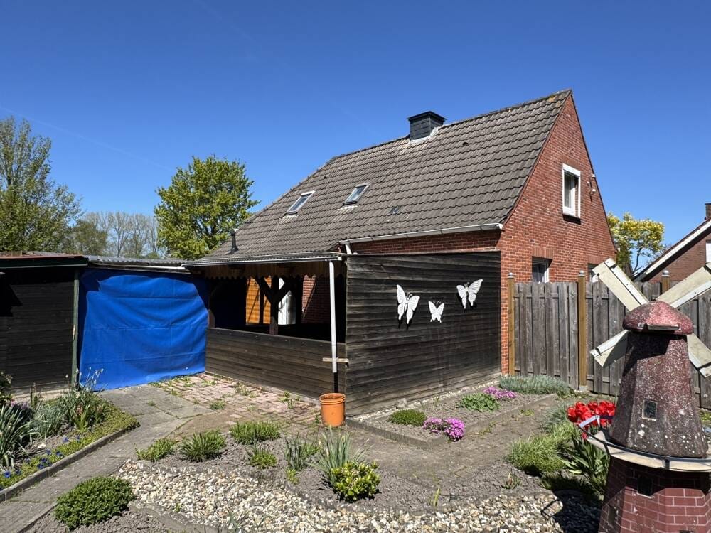Immobilie in Emden - Renovierungsbedürftiges Einfamilienhaus mit Garage, Carport und großzügigem Grundstück - Bild 4