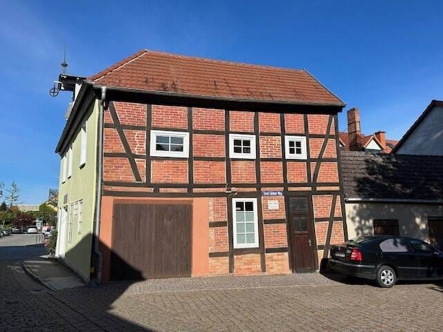 Immobilie in Stavenhagen - Eine lukrative, stadtbildprägende, denkmalgeschützte Kapitalanlage am Markt der Stadt! - Bild 4