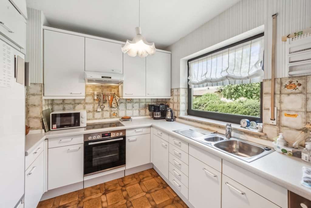 Immobilie in Kleinostheim - Wohnen, wo andere Urlaub machen – Ihr Zuhause mit Mainblick und Gartenidylle - Bild 1