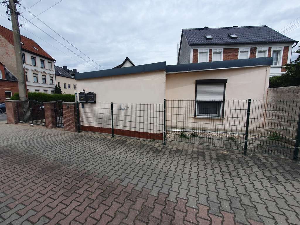 Immobilie in Eilenburg - Doppelhaushälfte mit separatem Bungalow in Eilenburg - Berg zu verkaufen! Ab mtl. 810,88 EUR Rate! - Bild 4
