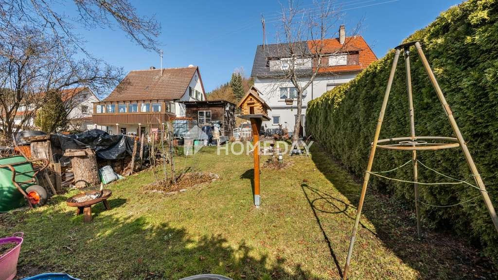 Immobilie in Meßstetten - Ankommen und wohlfühlen: Solide Doppelhaushälfte mit Süd-Terrasse,  Gartenidylle und Stellplatz - Bild 4