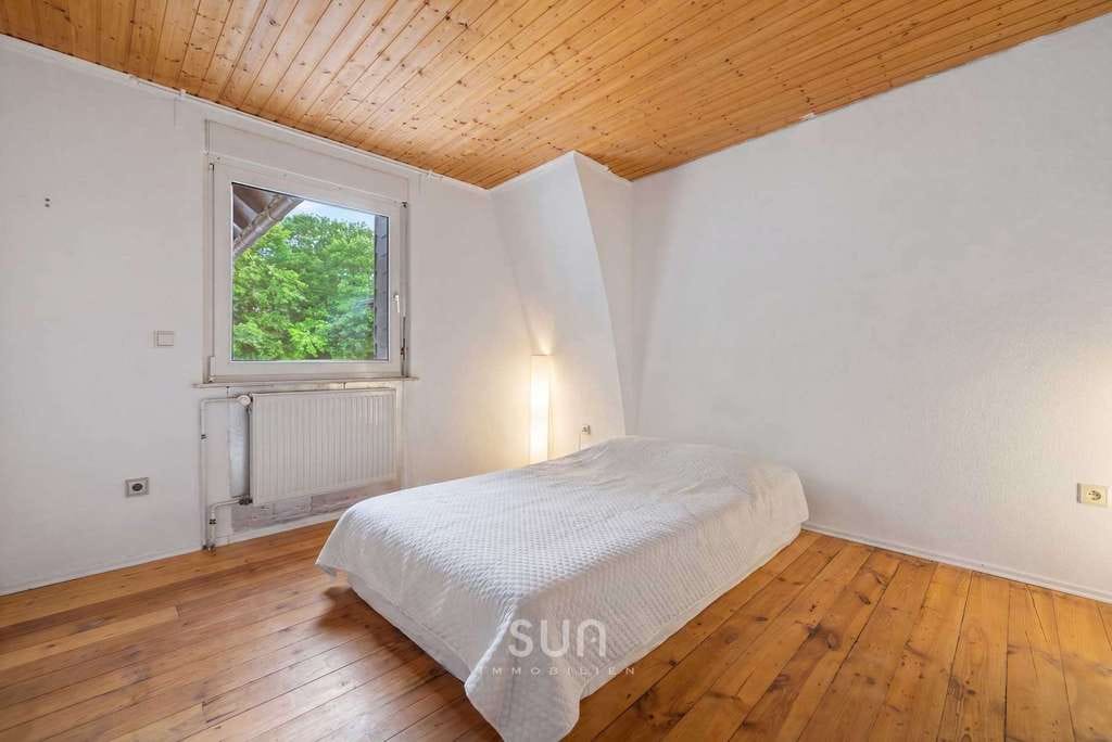 Immobilie in Wölfersheim - WO DER GARTEN DEN WALD INS HAUS HOLT! - Leben in erster Reihe zum Wölfersheimer See - Bild 2