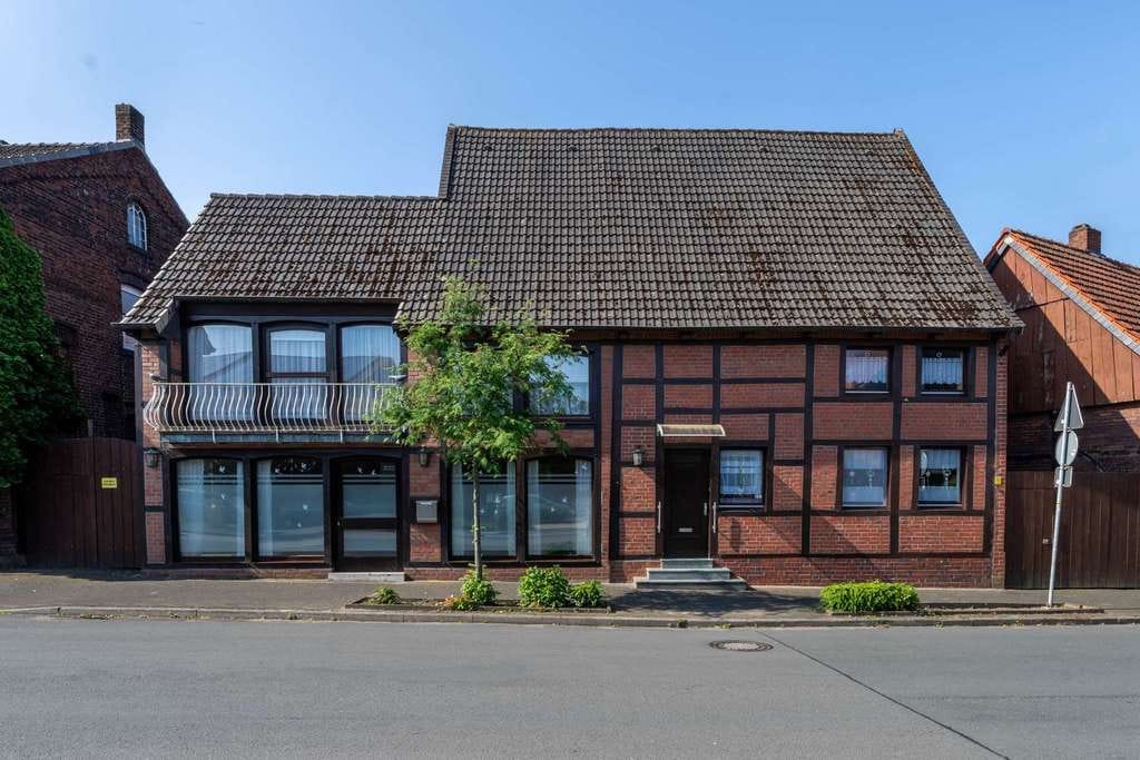 Immobilie in Nordkirchen - Charmantes 3-Häuser-Ensemble & Baugrundstück im Herzen von Südkirchen mit idyllischem Gartenparadies - Bild 2