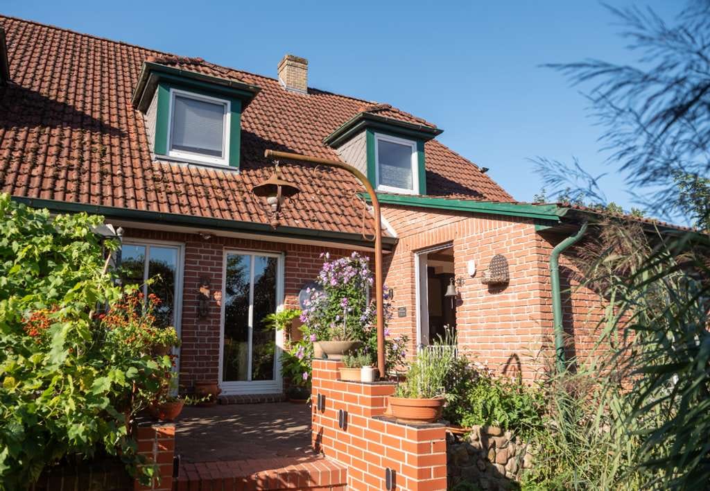 Immobilie in Grasberg - Einfamilienhaus mit Einliegerwohnung 
in idyllischer Lage - Bild 3