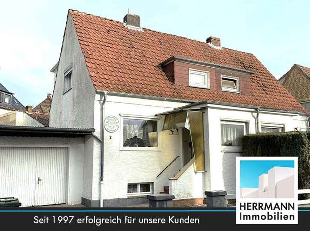 Immobilie in Bad Münder am Deister - Kleine gepflegte DHH mit zusätzlichen Wohnraum im Nebengebäude - Bild 0