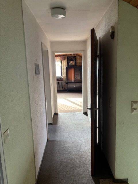 Immobilie in Bischweier - Wohn- Geschäftshaus  mit 2 Garagen + großzügigem Grundstück / Bestandsgebäude mit Sanierungs- oder Neubaupotenzial für Bauträger und Eigennutzer - Bild 1
