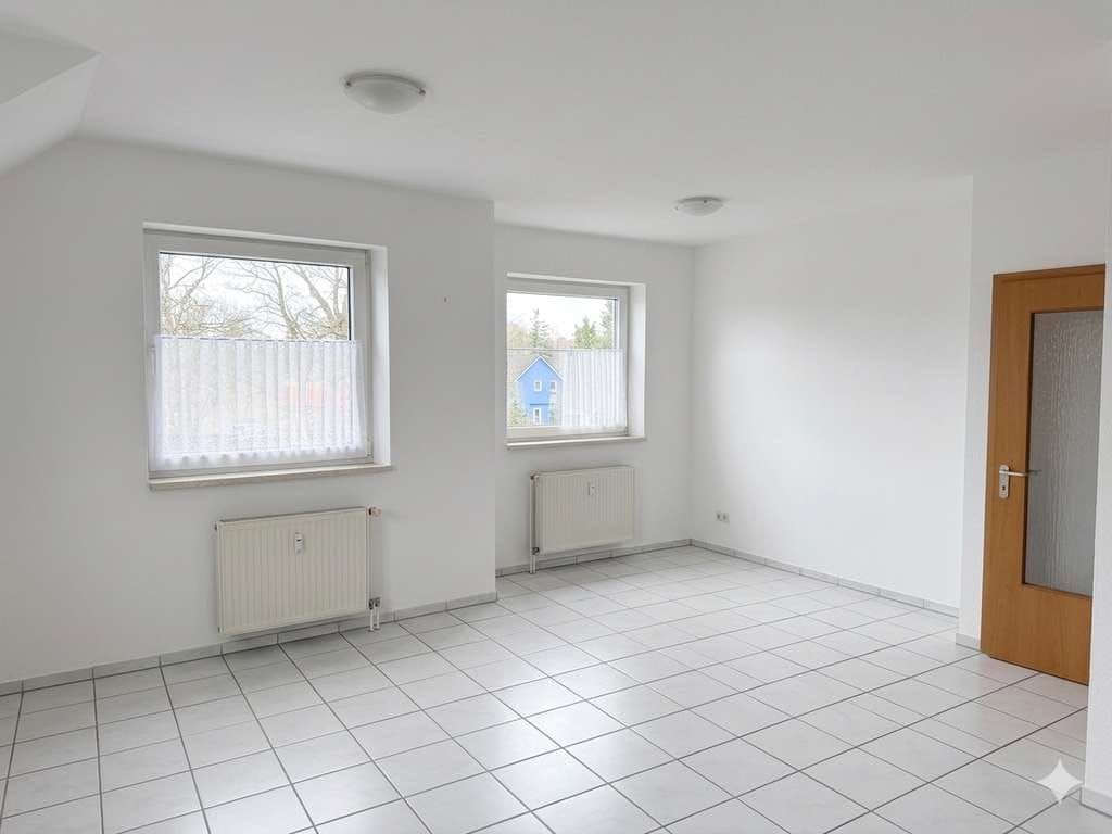 Immobilie in Burgdorf - Vermietete 2-Zi-Dachgeschosswohnung mit Loggia, EBK, Stellplatz & Keller – ca. 62,5 m² in Burgdorf - Bild 1